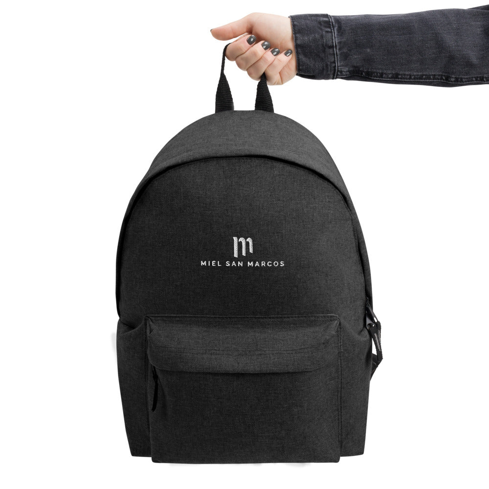Mochila bordada logo Miel San Marcos