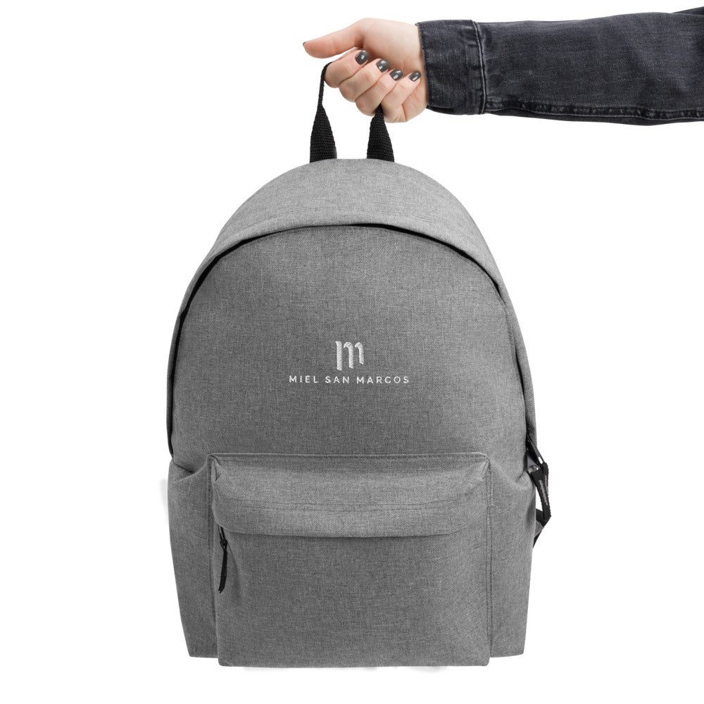 Mochila bordada logo Miel San Marcos